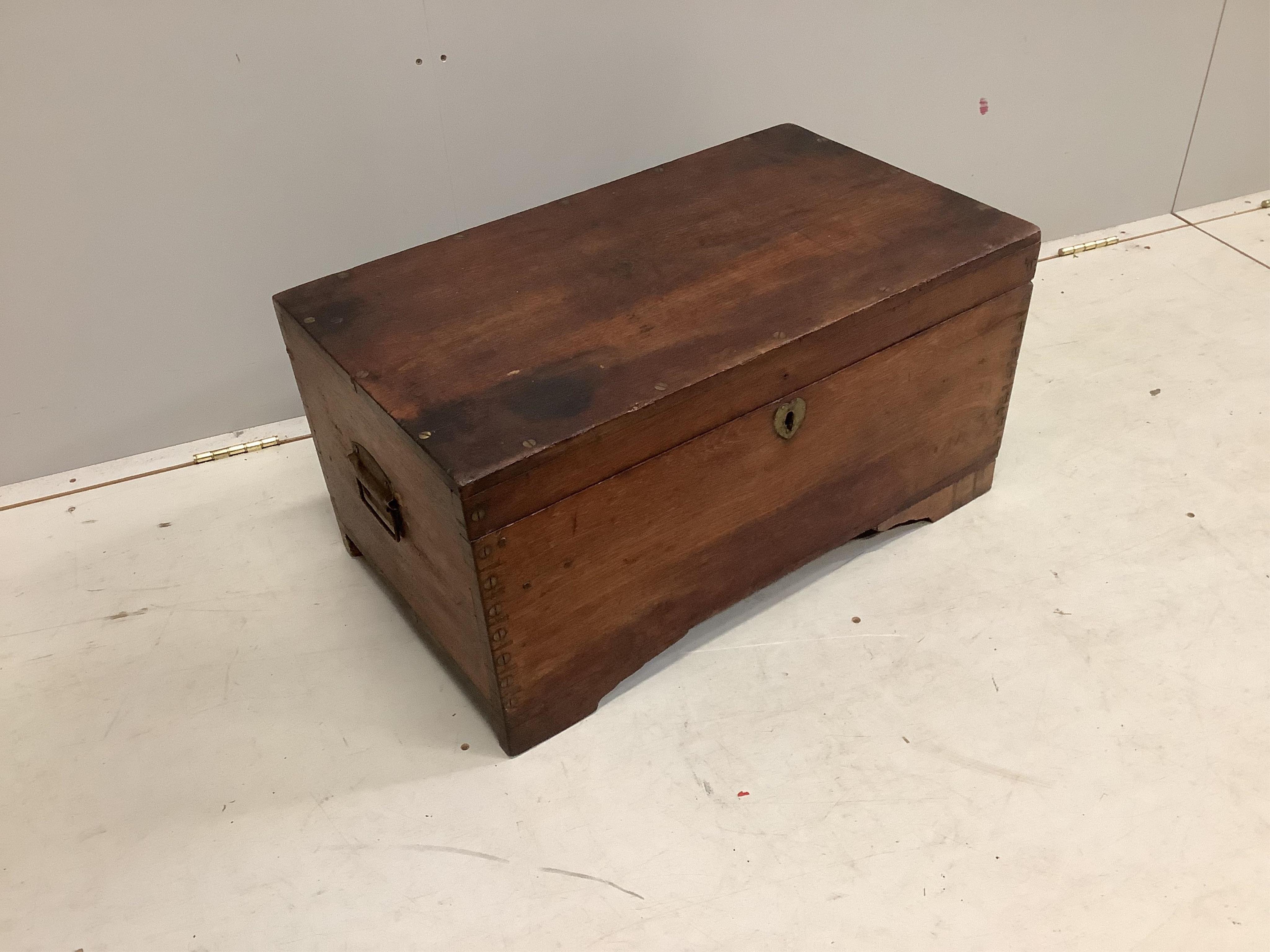 A small Anglo Indian hardwood trunk with fitted interior, width 69cm, depth 39cm, height 34cm. Condition - fair